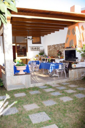 Отель Casa vacanze Rose E Fiori Sardegna  Сан Приамо
